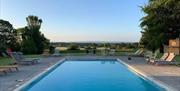 outdoor pool with view of countryside
