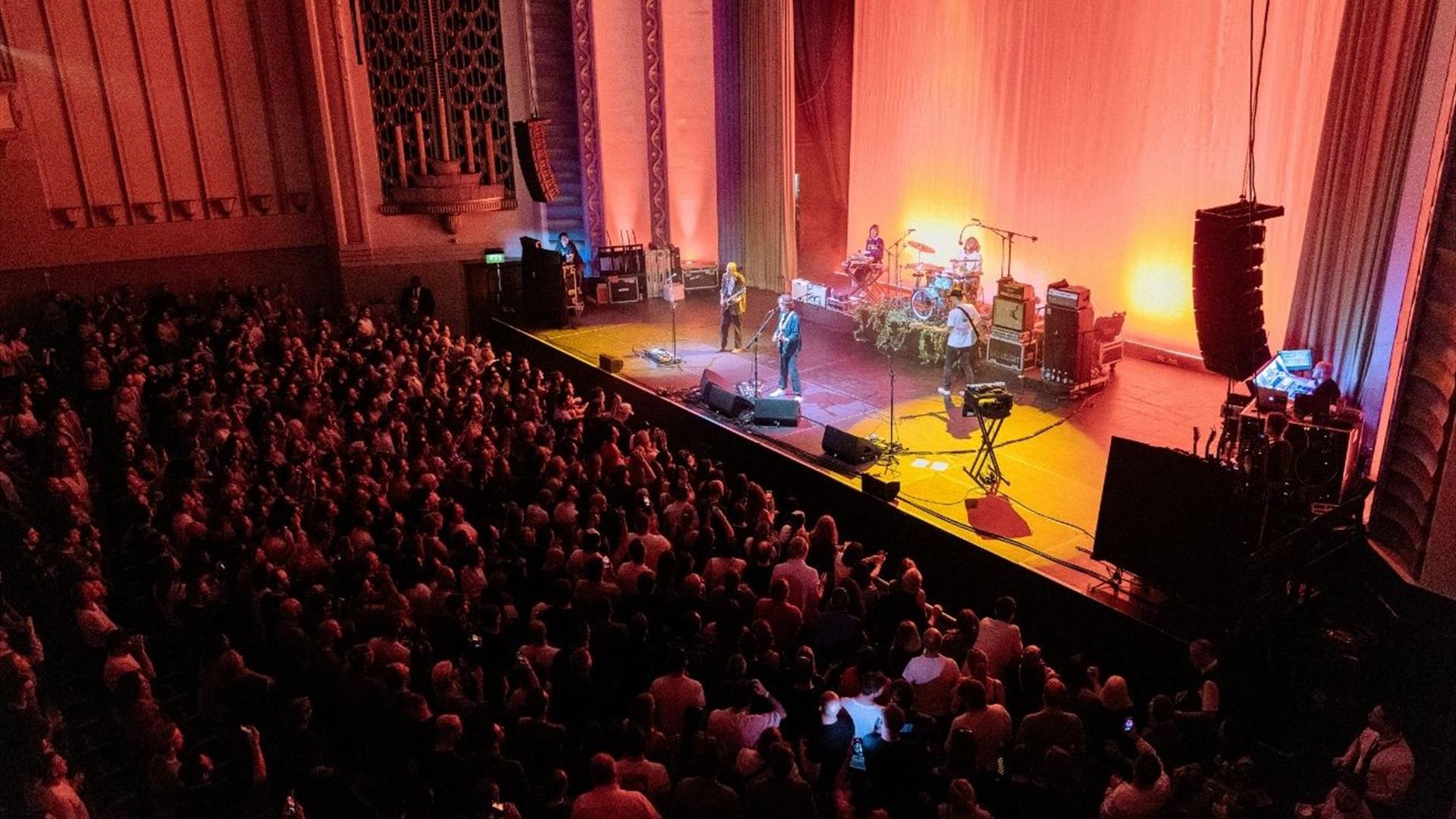 Live band on stage at The Forum