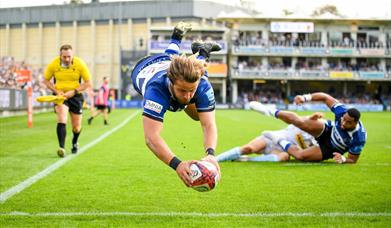 Bath Rugby player diving for a try 