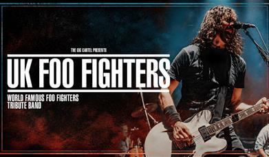 UK Foo Fighters tribute band poster showing a guitarist singing passionately on stage.