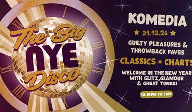 Poster for The Big NYE Disco at Komedia on 31.12.26, 10.15 to 3am, with a gold disco ball clock on a purple background.