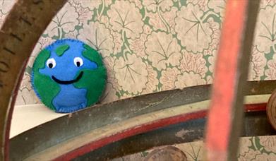 A felt planet hiding 