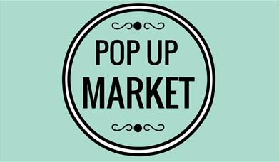 Pop Up Market's circular logo on a mint green background.