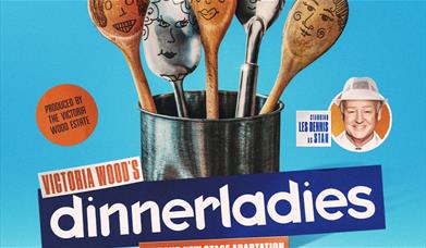 An image containing wooden spoons with various faces painted on. 