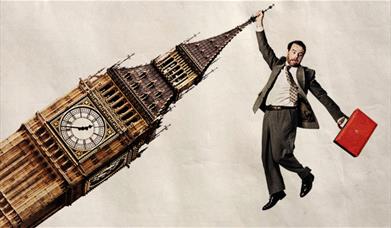 A comical image of a businessman hanging off of the Big Ben building, holding a red suitcase. 