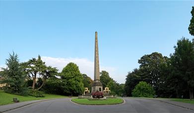 An image of the Victoria Column obelisk inside the Royal Victoria Park in Bath. 