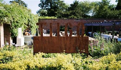 The exterior sign of the TIIGO restaurant at Montigo Resorts Somerset in Shepton Mallet. 