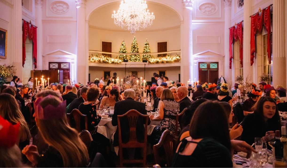 Guests sit for a black tie banquet in the Pump Room