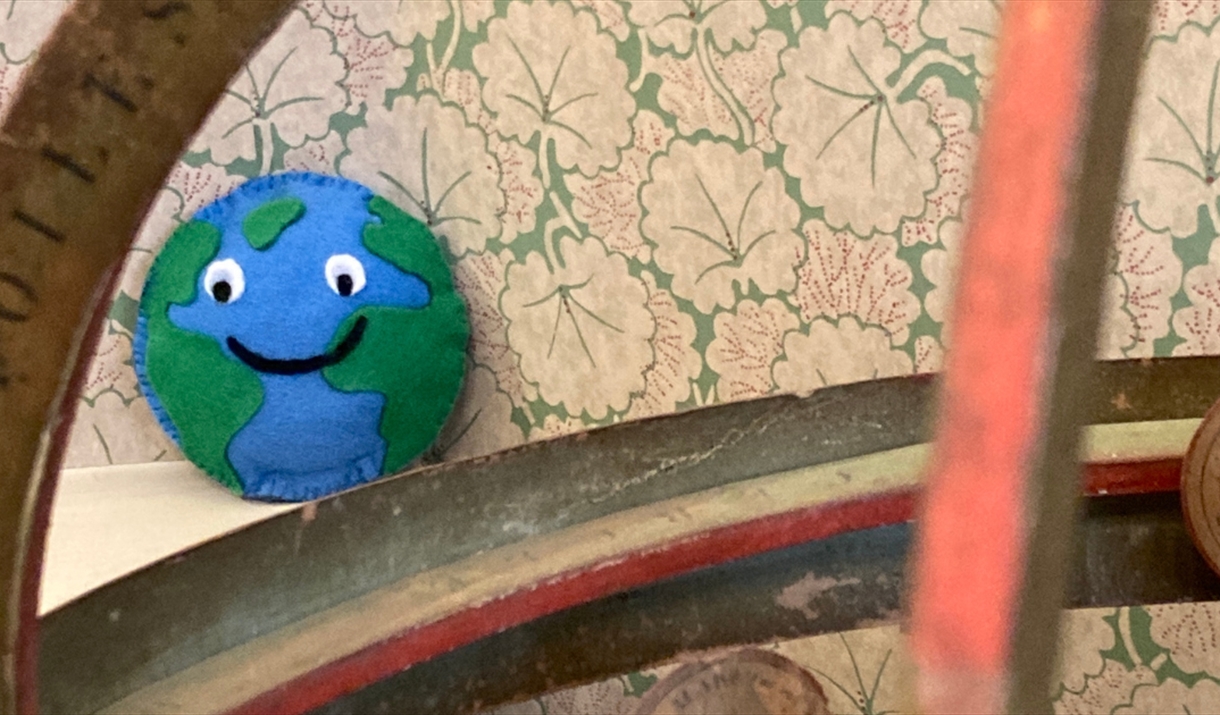 A felt planet hiding