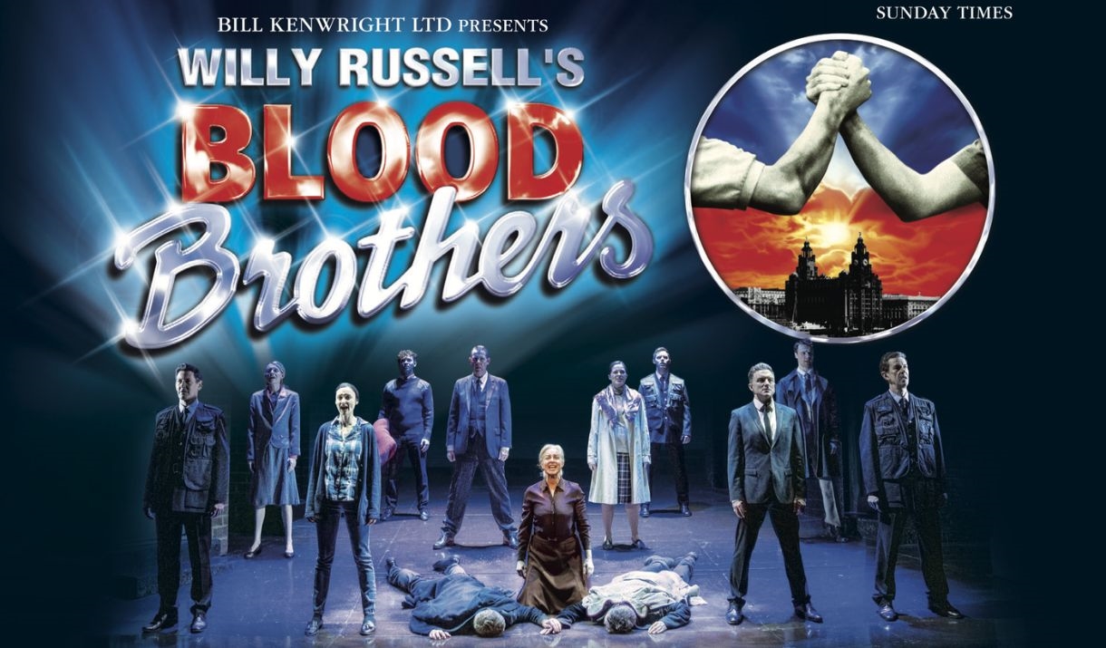 An image of the cast of Blood Brothers on stage.