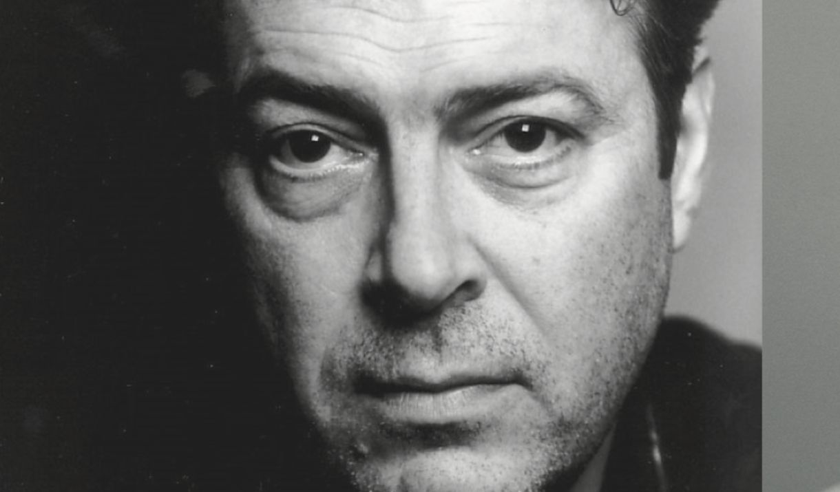 A black and white image of  actor Roger Allam.