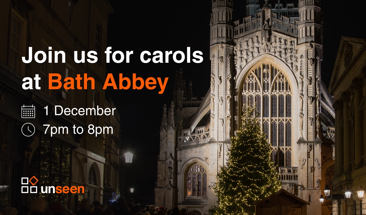 Bath Abbey at night with the caption 'carols at Bath Abbey' and Unseen's logo