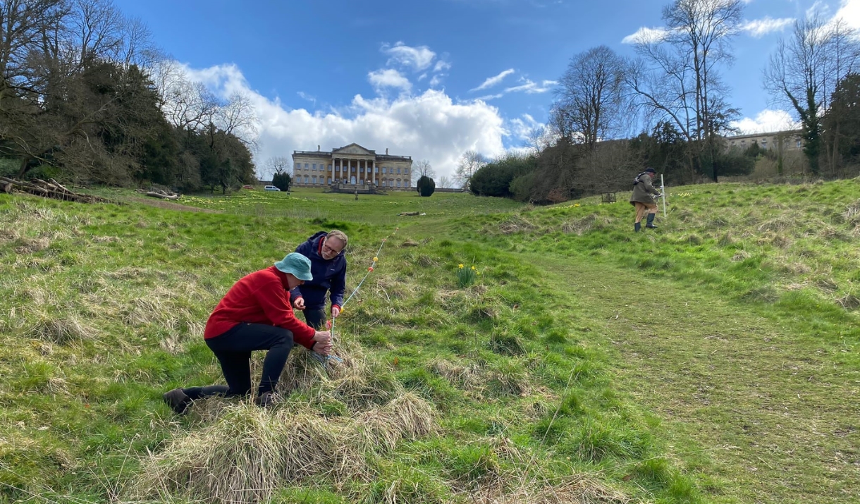 Volunteers in the Pasture surveying for water features.