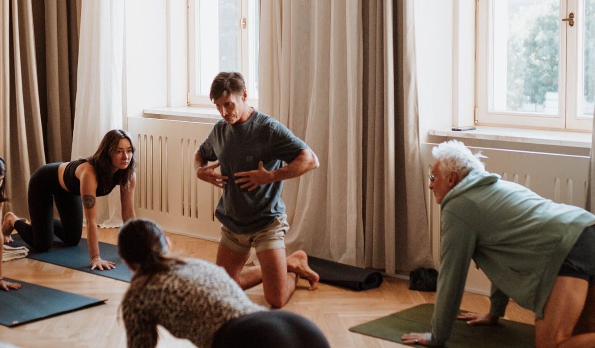 Adam Keen teaching students in a workshop