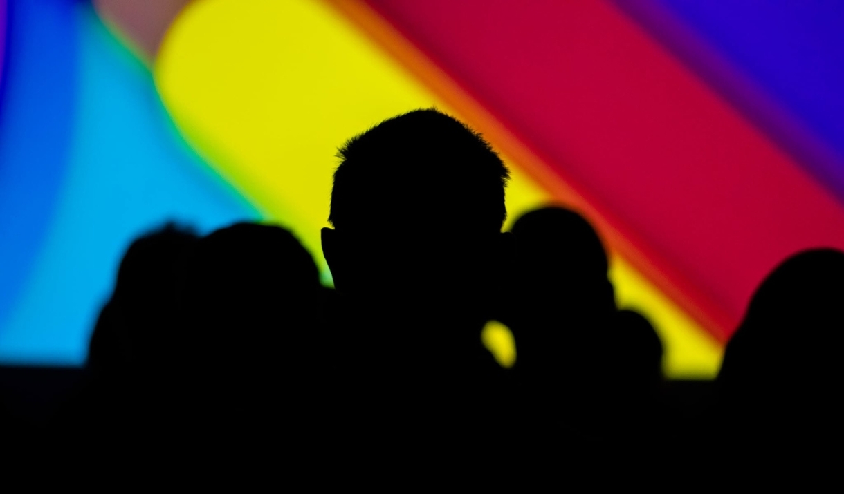 A silhouette of audience members watching a film at a FilmBath event