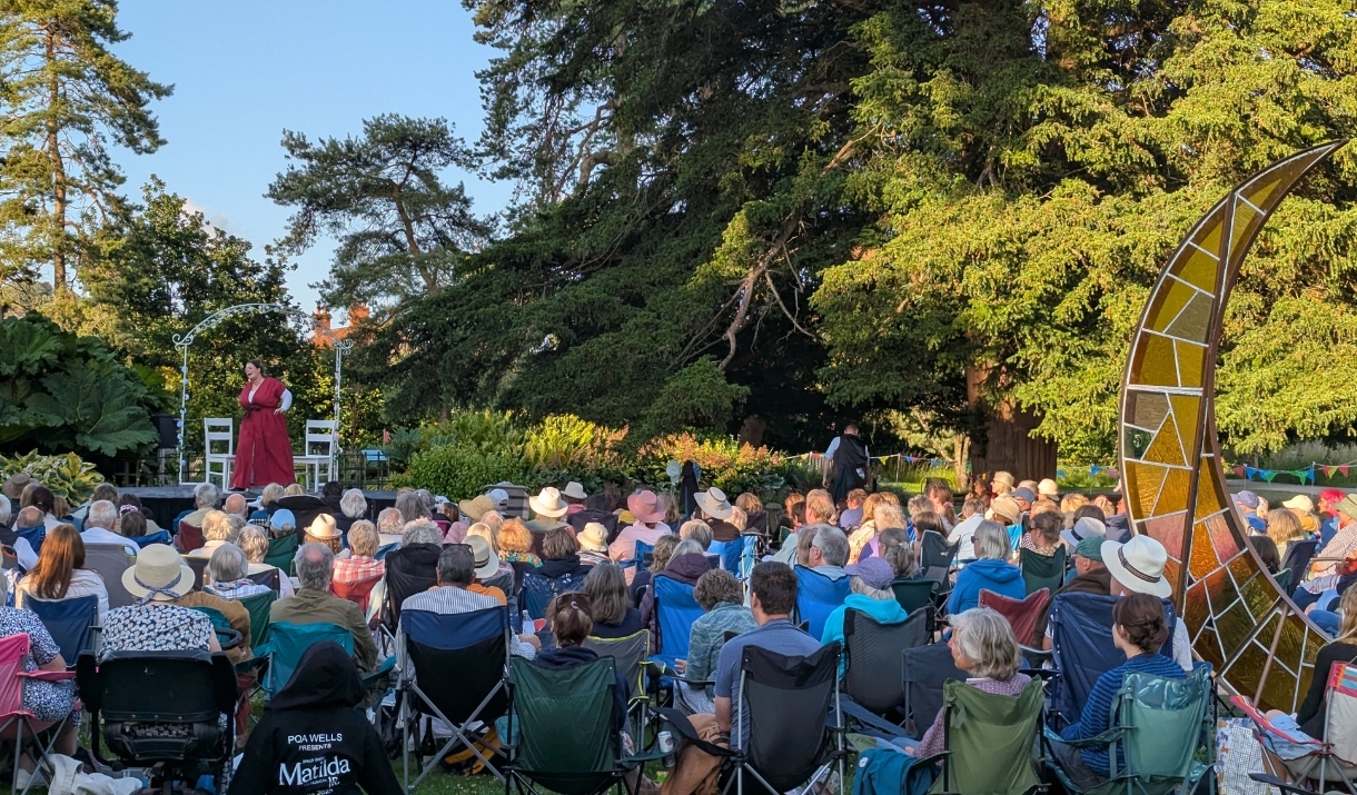 An image of the Pantaloons performing at The Bishop's Palace and Gardens during an open-air summer theatre event.