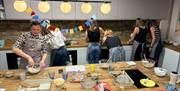 Women cooking at event