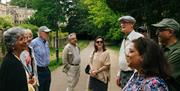 Tour guide talking with the group and sharing their knowledge