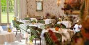 Ornate restaurant with garden view