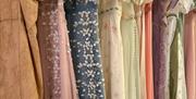 A row of regency-inspired dresses