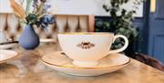 Cup of tea on a small plate