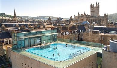 Thermae's rooftop spa, with Bath Abbey visible behind.